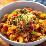Delicious bowl of American Goulash with pasta, ground beef, and tomato sauce.