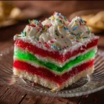 Delicious Jello Poke Cake with vibrant layers and whipped cream topping.