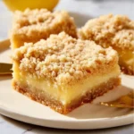 Delicious Lemon Crumb Bars with a crumbly topping and lemon filling