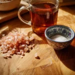 Warm gelatin drink served in a cozy setting with spices