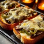 Delicious Steak and Cheese Garlic Toast garnished and ready to serve