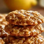 No-bake lemon oat cookies arranged on a plate, showcasing their vibrant color and texture.