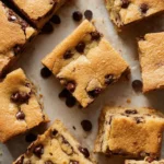 Delicious chocolate chip cookie bars, freshly baked and golden brown.