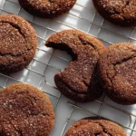 Freshly baked Chocolate Snickerdoodle cookies on a cooling rack