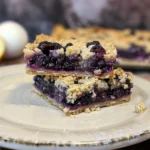 Delicious blueberry crumble bars with buttery topping and fresh blueberries